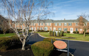 Main Bowdoin Square building with large sign.