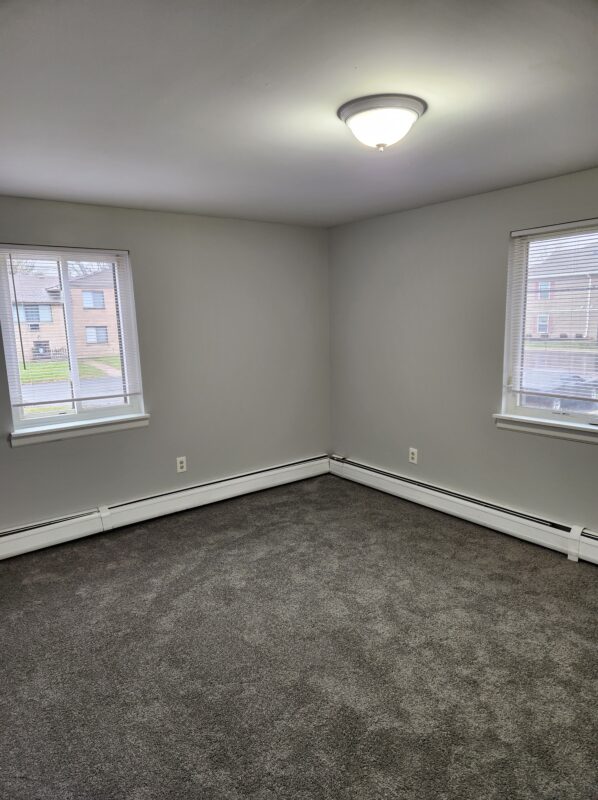 Renovated bedroom at Grecian Gardens Apartments in Rochester New York.