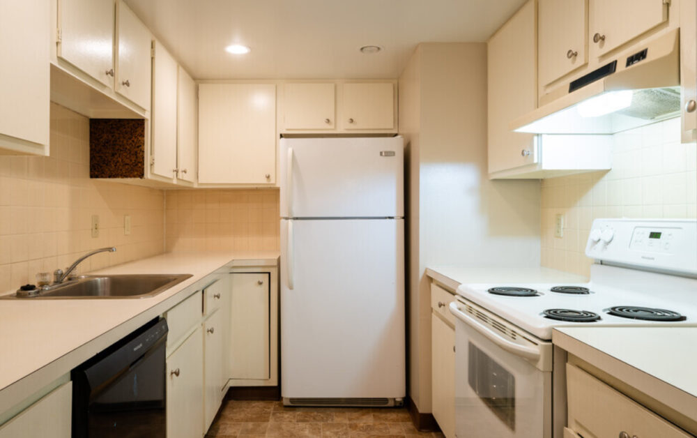 Kitchen with a lot of cabinet space at the Bowdoin Square Apartments.