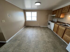 Non-renovated kitchen at Garden Village.