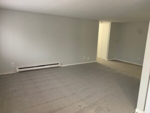 Chili Gardens updated living room in apartment unit.