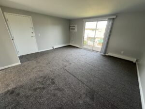 Renovated apartment living room at Garden Village.