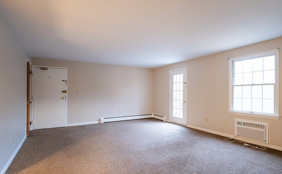 Renovated living room of a 2 bedroom 1 bathroom apartment at Bowdoin Square.
