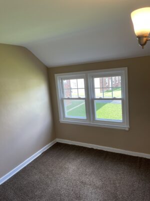 Milpine Garden Townhouse bedroom with windows.